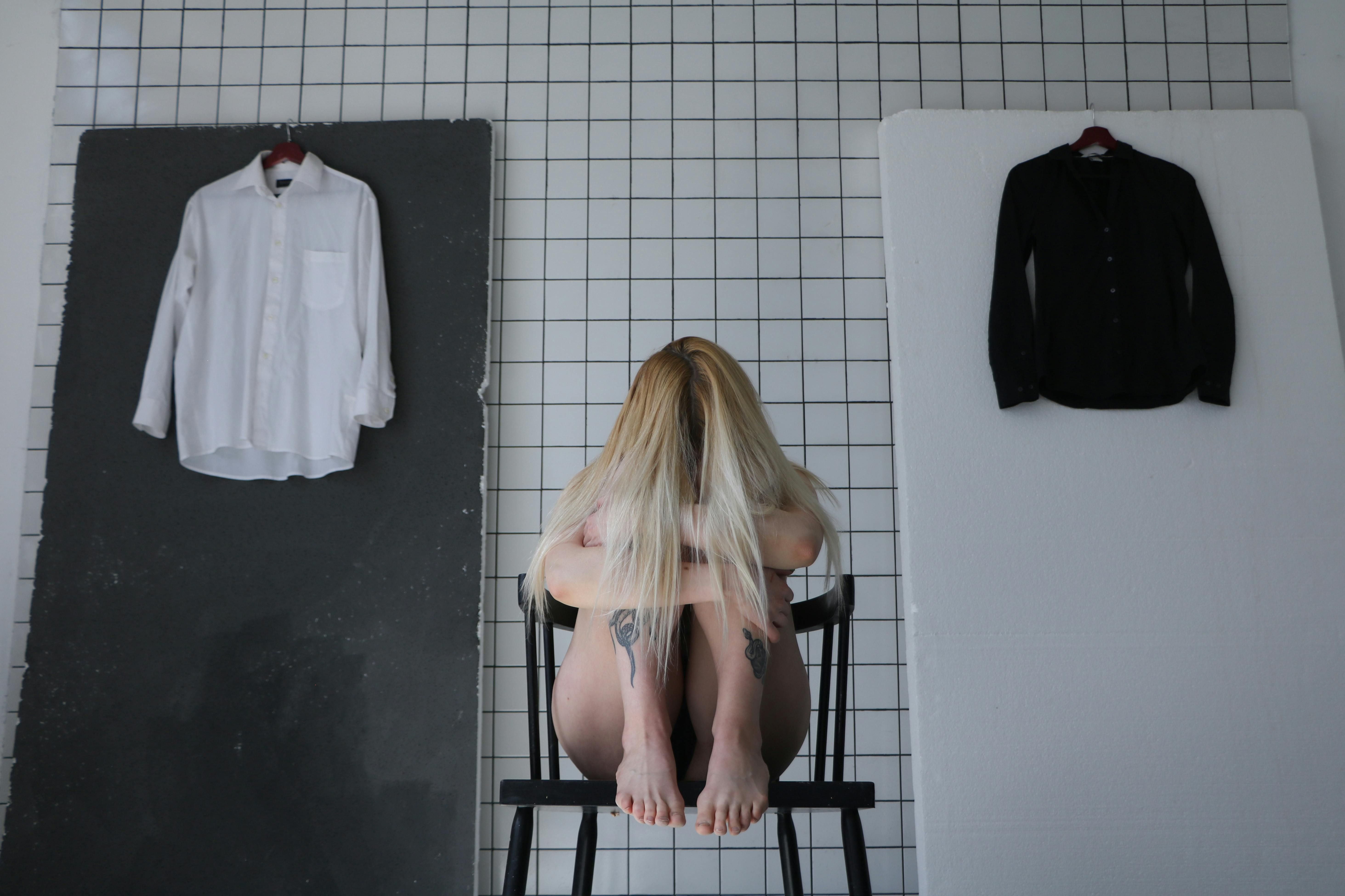 A woman experiencing the dual struggles of anorexia nervosa and ADHD, highlighting the complex interplay between these conditions.