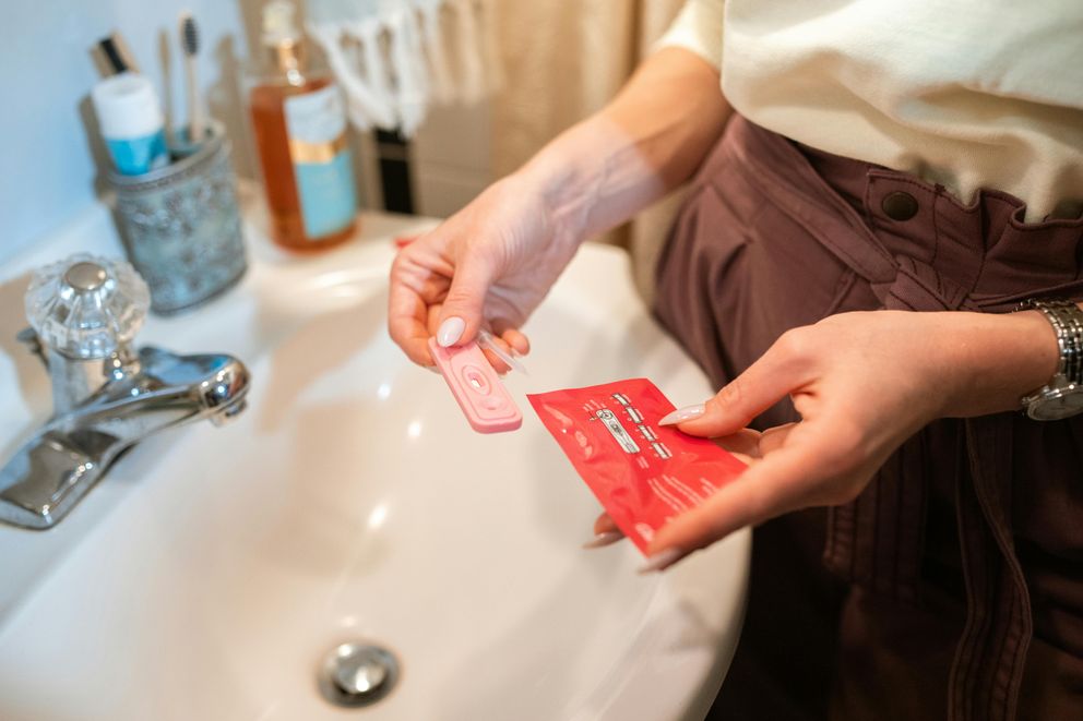 A woman managing her weight while using hormonal birth control, focusing on balanced nutrition, exercise, and hydration.