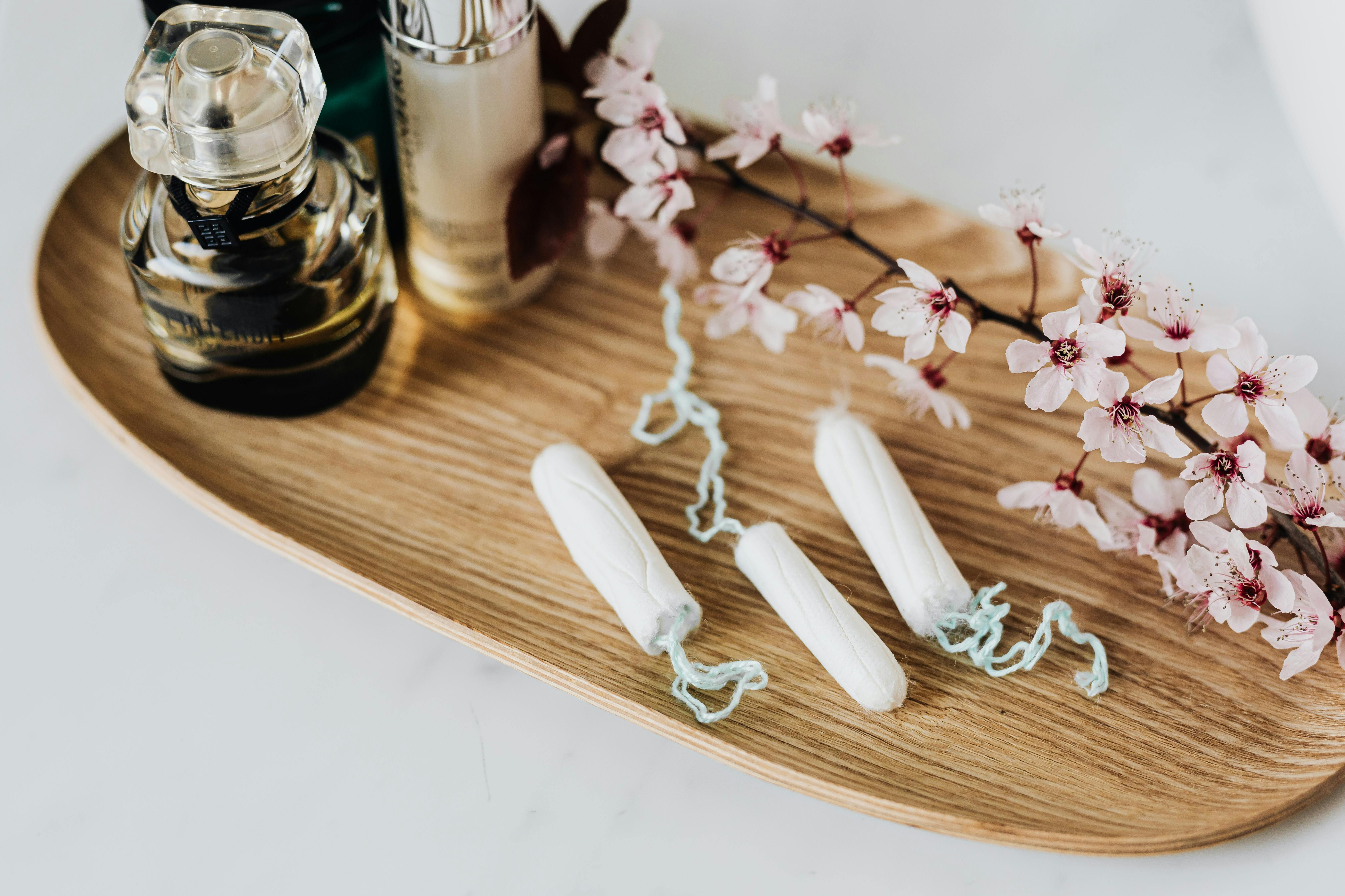 Menstrual hygiene products on a table, supporting women's health during intermittent fasting