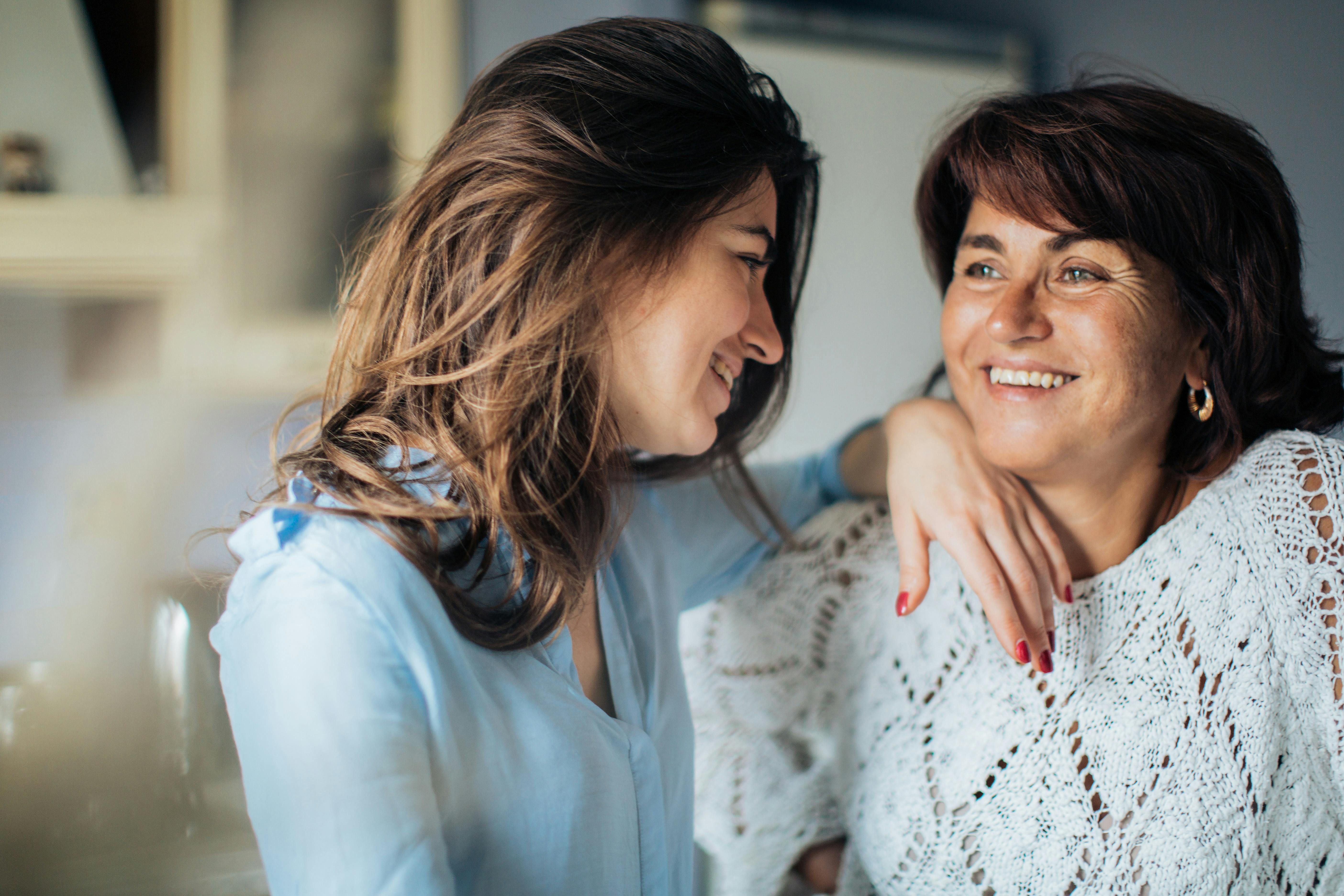 A mother and daughter together, reflecting on their relationship and working through emotional healing.