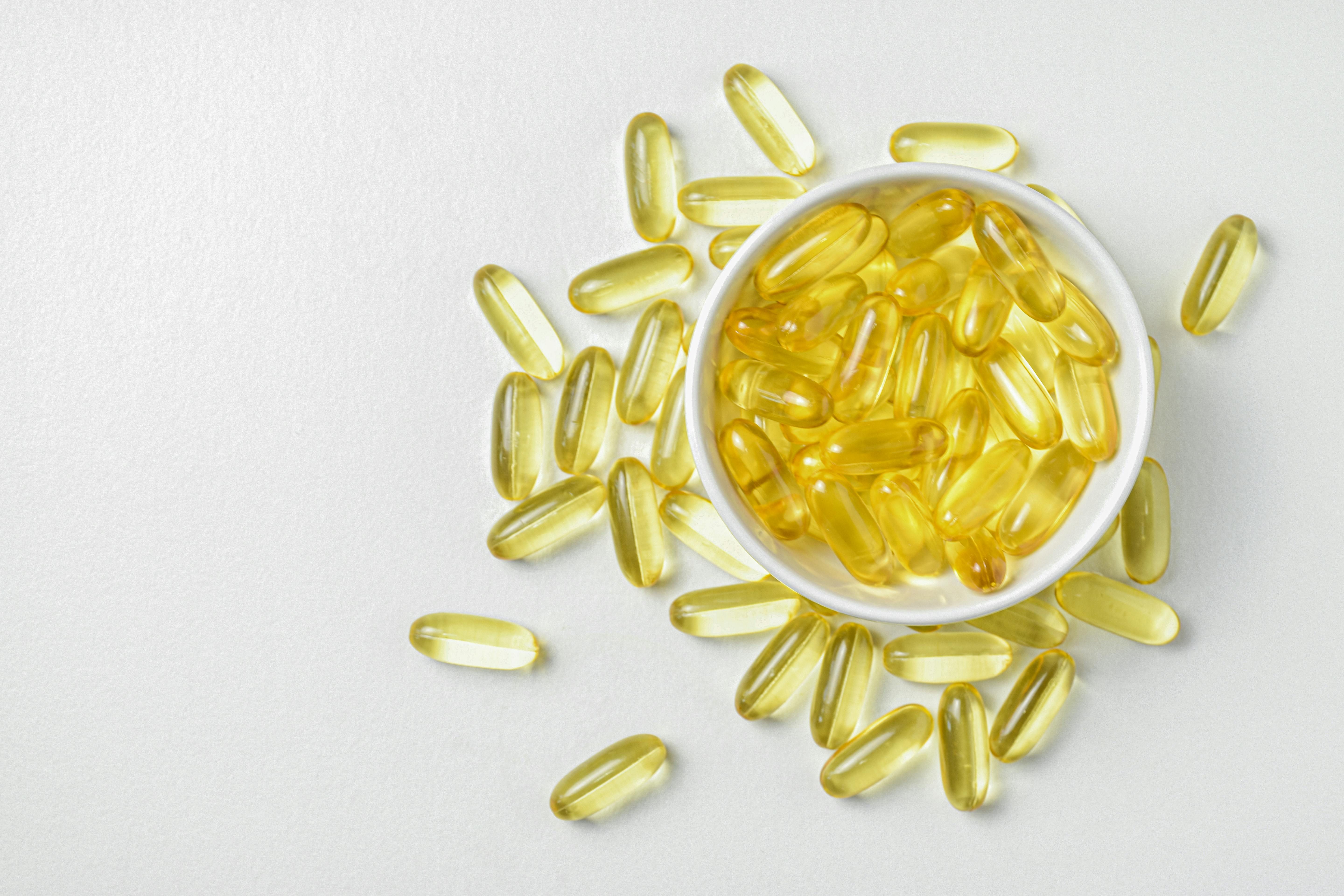 Assorted Omega 3 supplements displayed, ideal fish oil alternatives for women focusing on health and wellness.