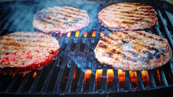 A woman enjoying seasonal variations of meat on the carnivore diet, embracing nutrient-rich cuts for optimal health.