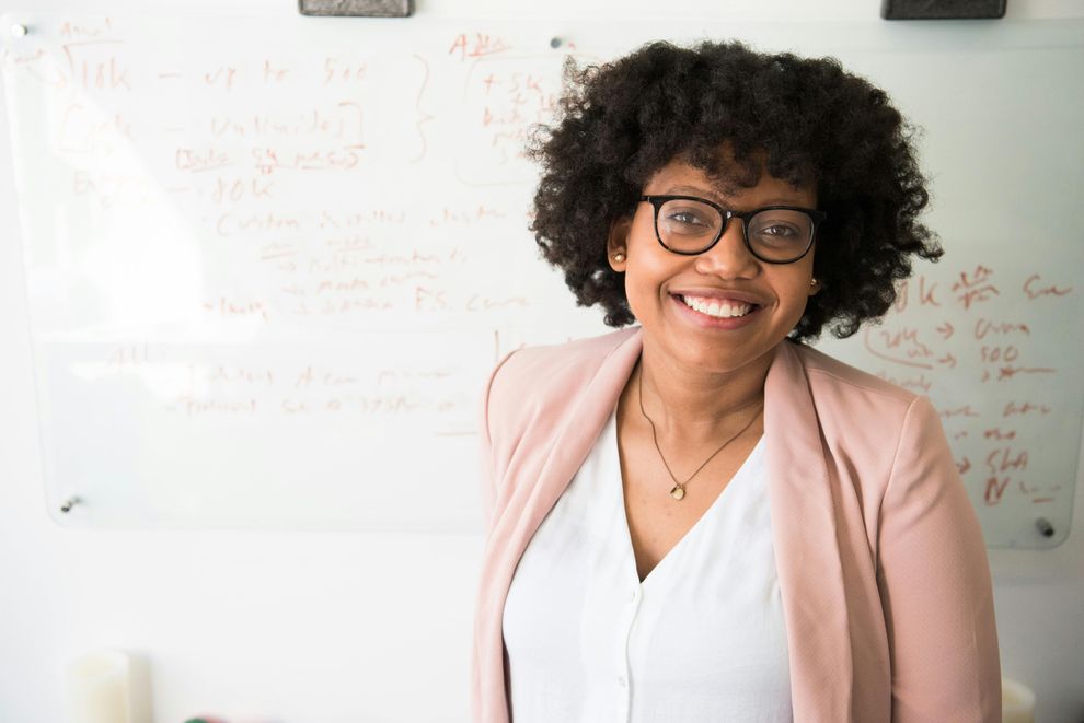 Woman feeling empowered and confident, symbolizing the positive impact of weight loss on sexual health