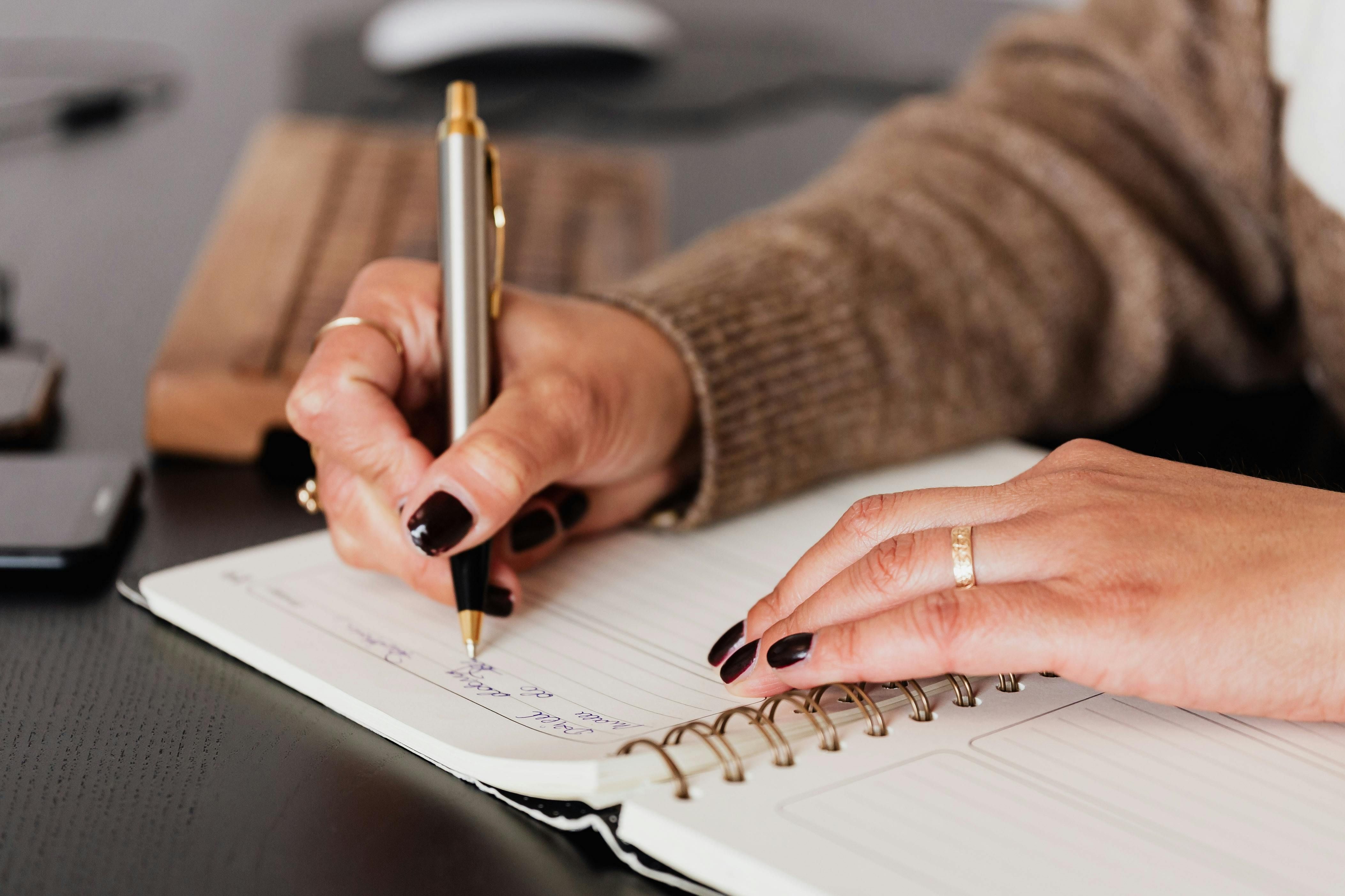 A woman journaling while intermittent fasting and taking antidepressants, symbolizing the importance of self-awareness and open communication with healthcare providers