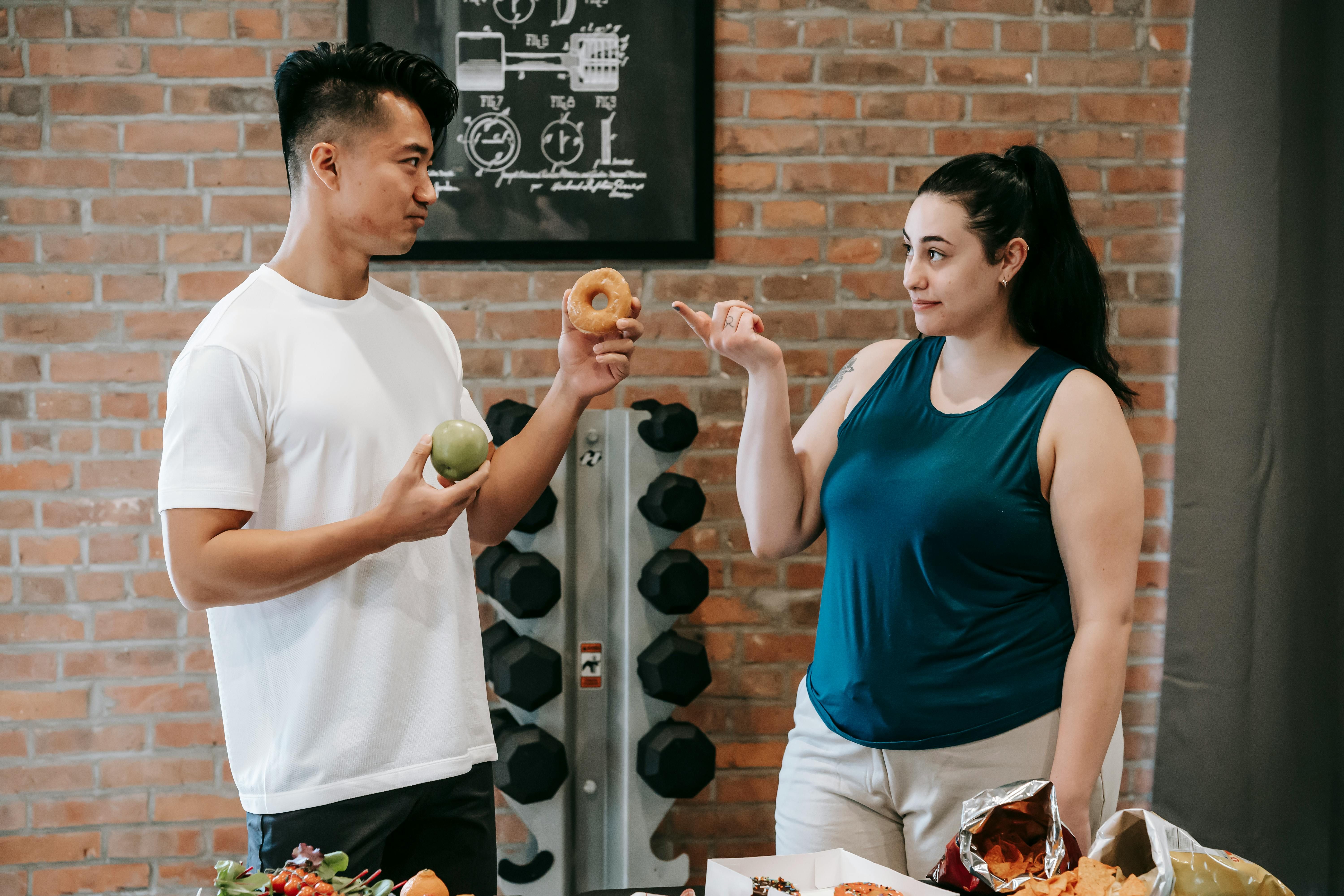 Woman contemplating healthy food choices, embodying the dietary changes with intermittent fasting