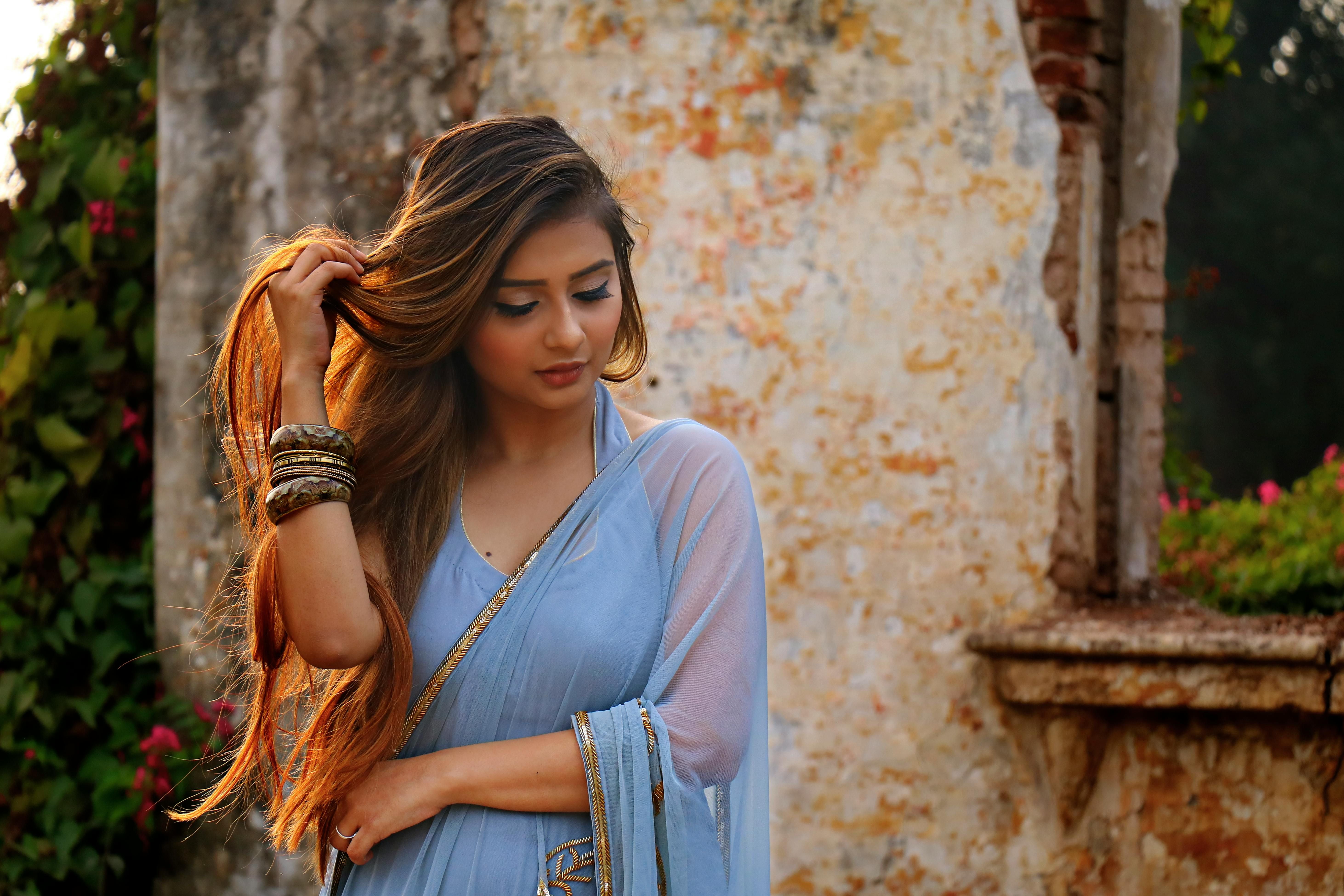 Woman with lustrous, healthy hair, representing the benefits of using effective hair supplements for women