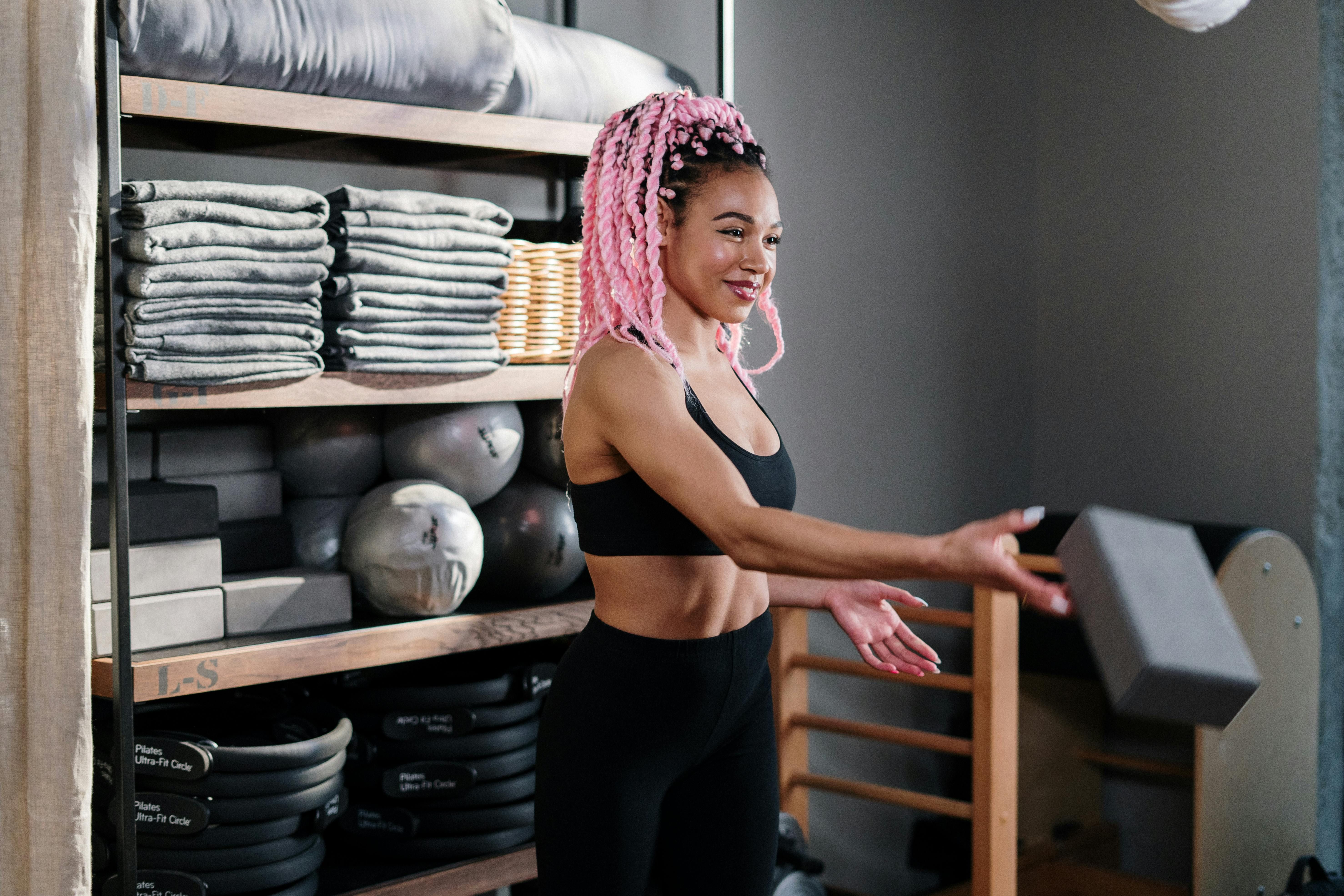 Happy woman working out, showcasing strength and joy in fitness journey